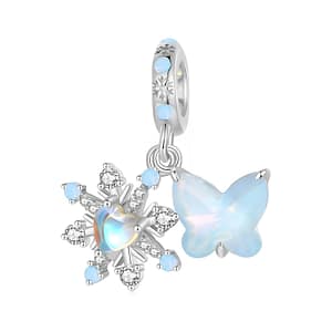 Snowflake Butterfly Dangle Charm featuring moonstone center, CZ stones, and blue glass butterfly - exquisite winter jewelry piece.