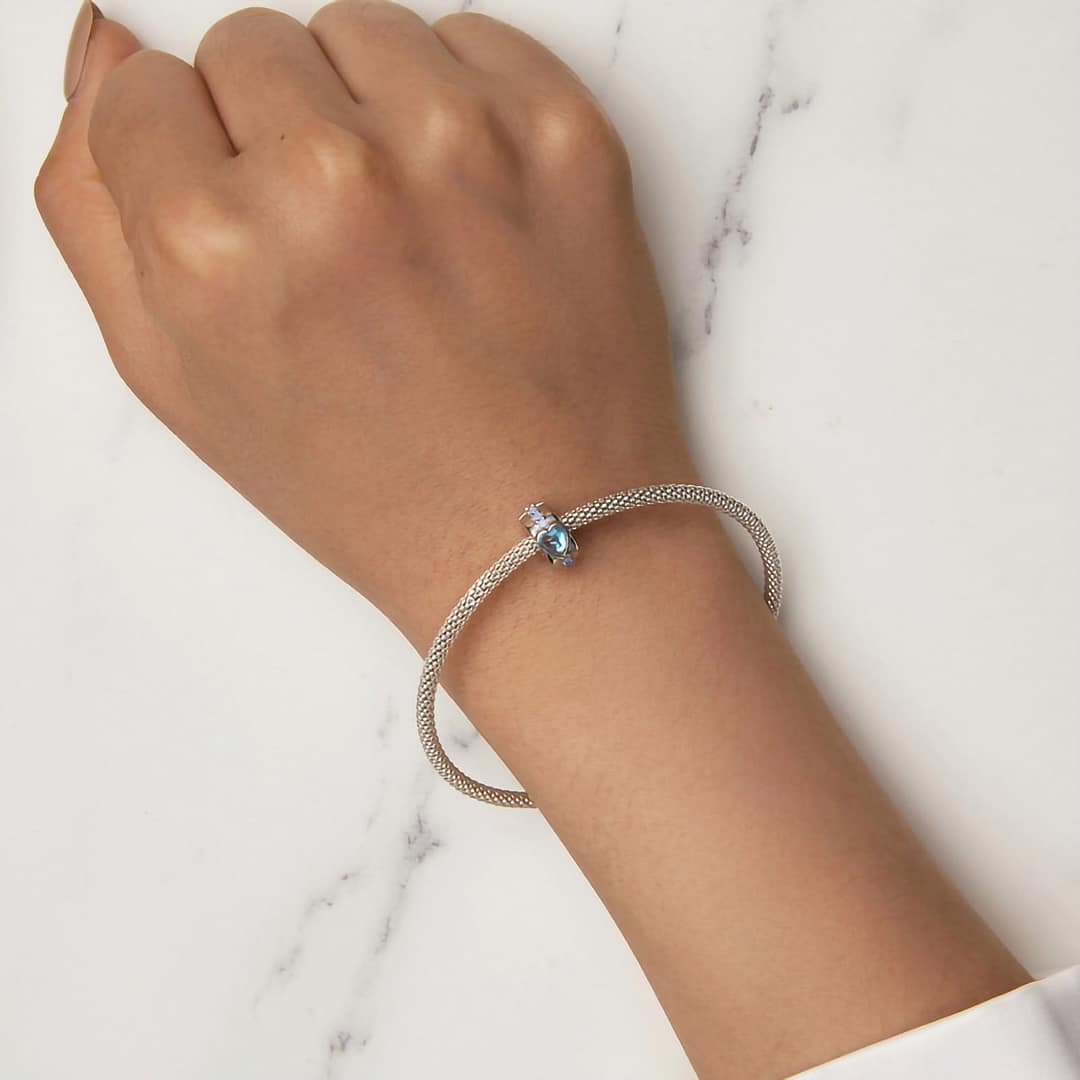 S925 Sterling Silver Cinderella Heart Clip Charm for Pandora Bracelet | Disney Lovers gift | Go Glam Girl 6 Cinderella Heart Clip Charm in s925 sterling silver, featuring a blue moonstone heart center and a line of opal stones, part of the Cinderella Charms Collection, symbolizing hope.