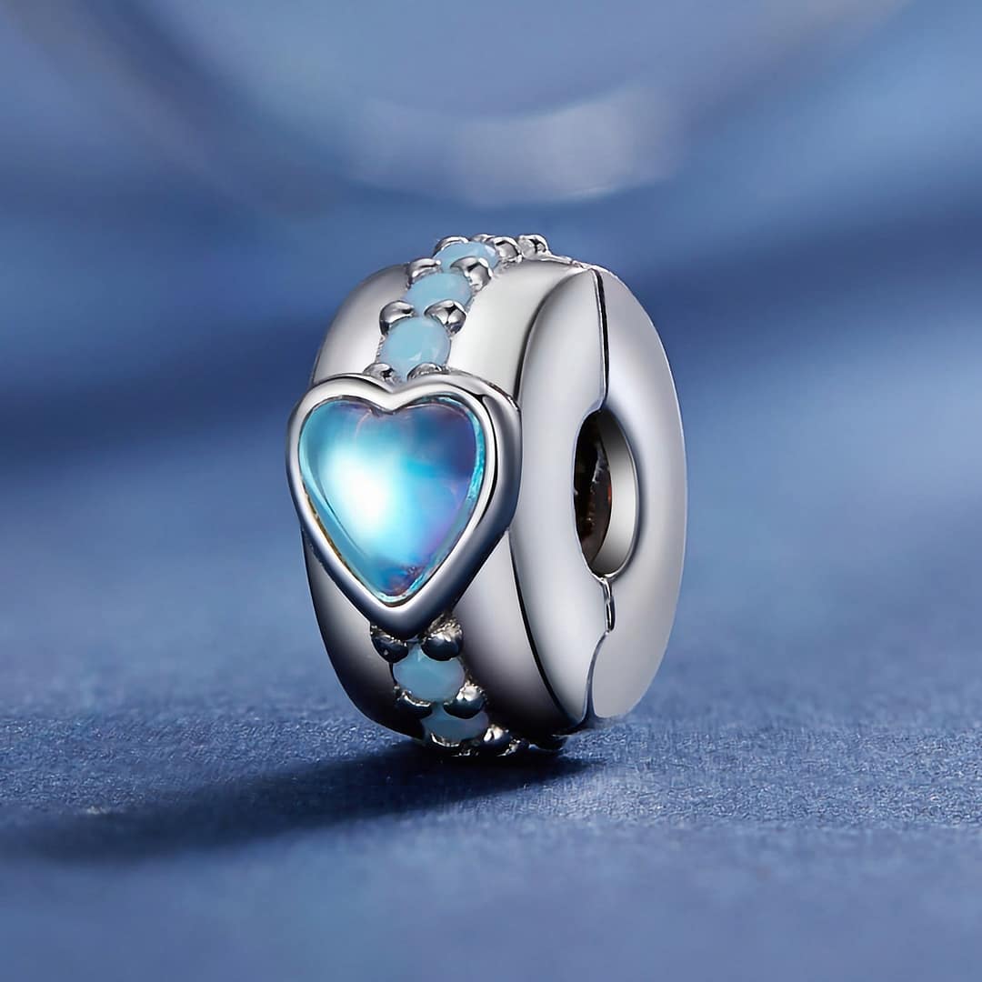 S925 Sterling Silver Cinderella Heart Clip Charm for Pandora Bracelet | Disney Lovers gift | Go Glam Girl 3 Cinderella Heart Clip Charm in s925 sterling silver, featuring a blue moonstone heart center and a line of opal stones, part of the Cinderella Charms Collection, symbolizing hope.