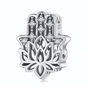 Guardian Fatima Hand Charm crafted in sterling silver, adorned with cubic zirconia stones and lotus flower symbol. Spiritual jewelry accessory.
