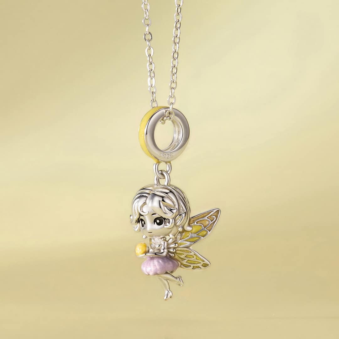 Home 73 S925 sterling silver Sunbeam Fairy charm with golden-yellow wings and lilac accents