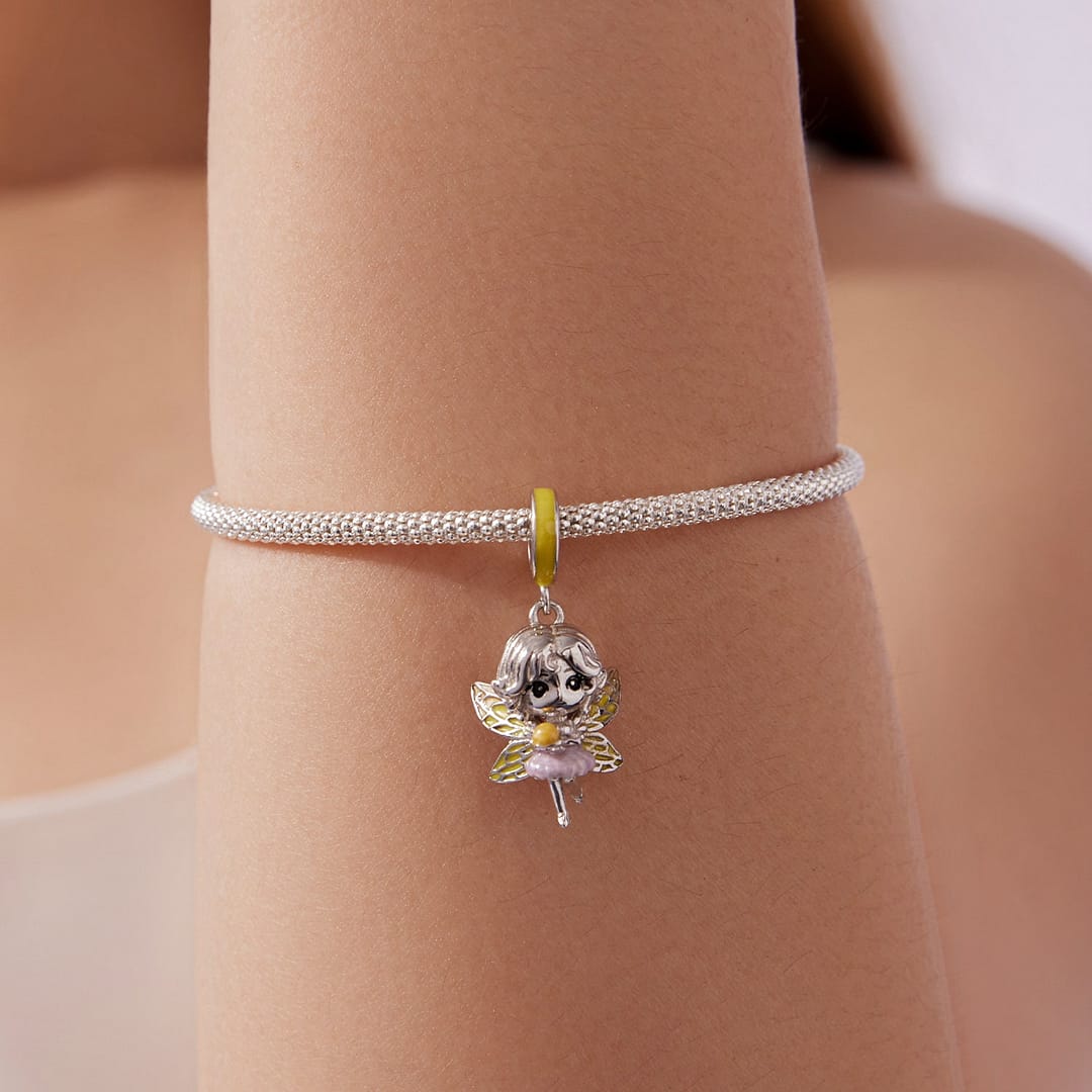 Home 76 S925 sterling silver Sunbeam Fairy charm with golden-yellow wings and lilac accents