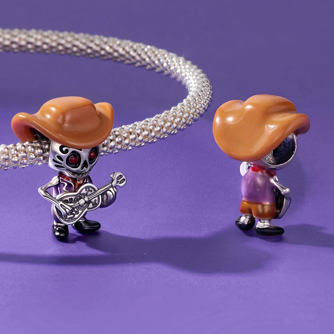 Home 17 S925 sterling silver Cowboy Skeleton Guitarist Charm wearing a brown cowboy hat and holding a decorative guitar – Coco Charms Collection.
