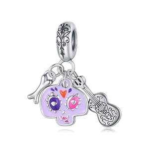 Purple Sugar Skull & Guitar Dangle charm featuring a lavender sugar-skull face, bone accent, and detailed silver guitar on an S925 bail with ornate black patterning.