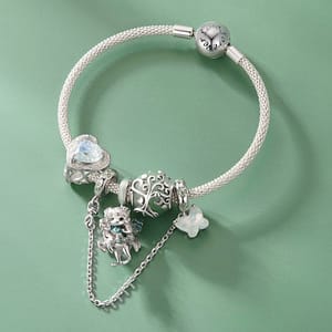 Discover Magic in Every Detail with the Fairy Charms Collection 10 S925 sterling silver Forest Fairy charm with mint-green enamel and flowing hair
