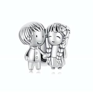 Little boy and girl stopper charm in sterling silver, ideal for charm bracelets, depicting innocence and childhood memories.