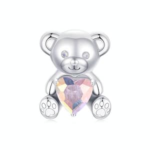 Sterling silver Pink Heart Teddy Bear Love Charm, a whimsical addition to our Teddy Bears Love Charms Collection. Adorned with opal eyes, perfect for Valentine's Day. Combine with other charms to create 'I Love U.' #LoveCharm #ValentinesJewelry #TeddyBearCharm