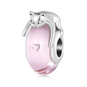 Captivating Pink Glass Cat Charm - Sterling Silver cat-shaped charm with pink glass bead and shimmering pink zirconium stones. Symbolizes grace and femininity. Perfect for charm bracelets and necklaces. Add a touch of whimsy and elegance to your jewelry collection with this playful feline-inspired accessory.