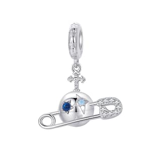 Close-up photo of the Safety Planet Dangle Charm from our Parallel Universe Charms Collection. The charm features a silver planet with stars encrusted with cubic zirconia stones and cut-out details, and a safety pin adorned with cubic zirconia stones through the planet.