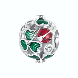 Captivating Ladybugs & Clovers Classic Round Charm in s925 sterling silver. Green enamel clovers and sparkling cubic zirconia. Symbolic luck in every detail.