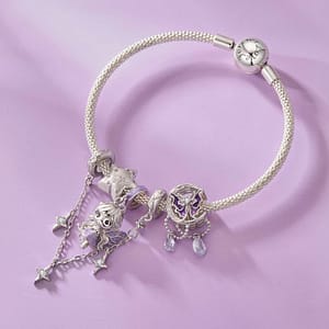 Discover Magic in Every Detail with the Fairy Charms Collection 4 S925 sterling silver Lavender Sky Fairy charm with soft lavender enamel and star details