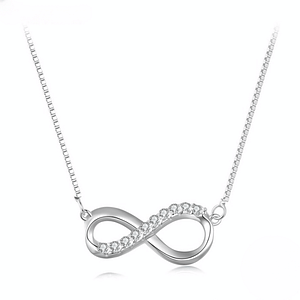 "Infinite Love Moissanite Necklace" - a stunning s925 sterling silver necklace featuring an infinity pendant adorned with sparkling moissanite stones, symbolizing eternal love and connection. Adjustable length for perfect fit. Perfect gift for special occasions. Hypoallergenic and high-quality.