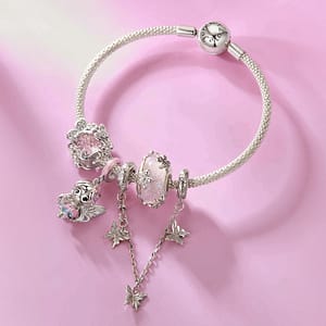 Discover Magic in Every Detail with the Fairy Charms Collection 7 S925 sterling silver Rose Petal Fairy charm with blush-pink enamel and wavy silver hair
