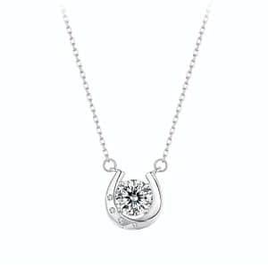 Capture luck and luxury with our Horseshoe Moissanite Necklace. Sterling silver adorned with cubic zirconia, showcasing a radiant 1-carat moissanite. Elevate your style!