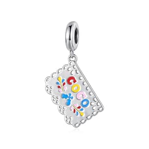 Sterling silver Papel Picado “Coco” charm with colorful enamel details and intricate cutout lace design