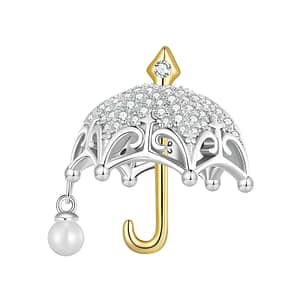 Whimsical Parasol Charm: A vintage-inspired sterling silver charm adorned with cubic zirconia, gold and a shell pearl dangle. Symbolic of elegance and nostalgia, perfect for jewelry enthusiasts. Shop now and add a touch of whimsy to your collection with this exquisite picnic-inspired jewelry charm.