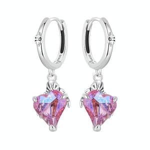 Sterling silver drop earrings with pink heart held by skeleton hands, a symbol of unique love. Edgy, gothic fashion for a bold statement. Hypoallergenic and stylish.