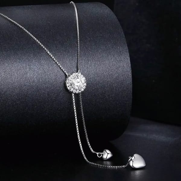 Affordable Glam: Moissanite Jewelry That Looks Expensive But Won't Break the Bank 40 Elevate your style with our Sparkling Moissanite Tassel Necklace, featuring a 0.5-carat moissanite and chic tassel chains in s925 sterling silver. Perfect for a touch of glamour! ✨