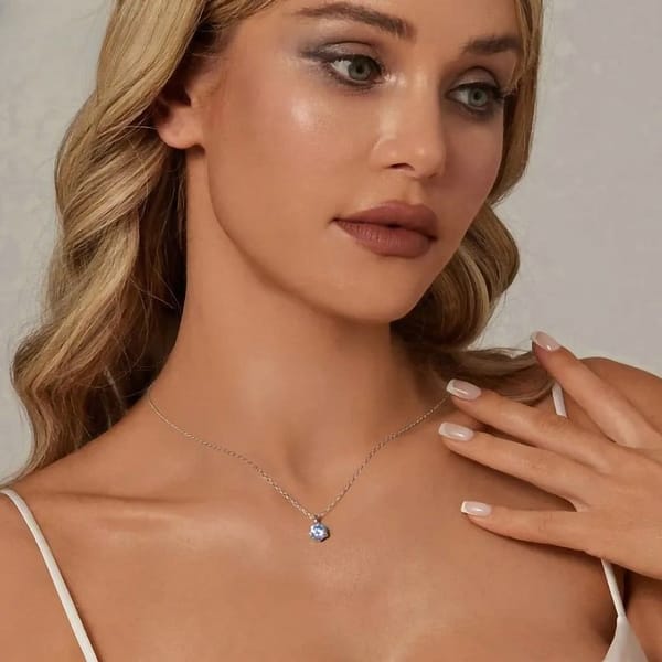 Affordable Glam: Moissanite Jewelry That Looks Expensive But Won't Break the Bank 33 Experience oceanic allure with our Aquamarine Moissanite Necklace. Sterling silver beauty with a 1-carat moissanite, a sea-inspired masterpiece 🌊💎