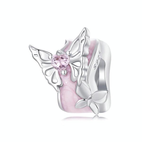 Buzzworthy Beauties: 10 Must-Have Bug-Inspired Jewelry Pieces of 2023 12 Monet's Garden Butterflies Dream Spacer Charm: Sterling silver spacer charm with pink enamel, featuring two silver butterflies and pink glass crystal.