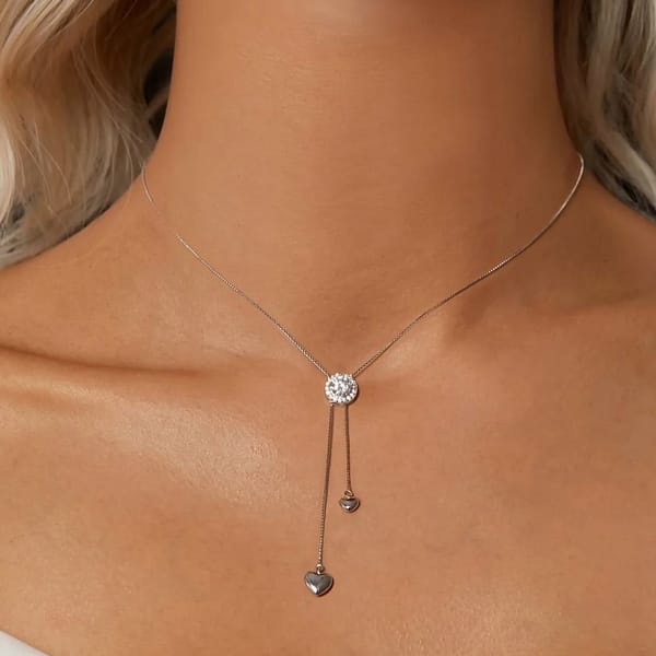 Affordable Glam: Moissanite Jewelry That Looks Expensive But Won't Break the Bank 42 Elevate your style with our Sparkling Moissanite Tassel Necklace, featuring a 0.5-carat moissanite and chic tassel chains in s925 sterling silver. Perfect for a touch of glamour! ✨