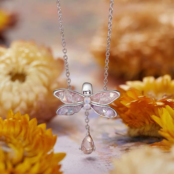 Buzzworthy Beauties: 10 Must-Have Bug-Inspired Jewelry Pieces of 2023 20 Monet's Garden Dragonfly Stopper Charm in sterling silver, adorned with pink and purple glass stones. Perfect for bracelet. Nature-inspired jewelry.