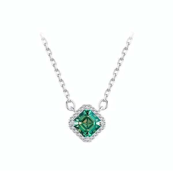 Affordable Glam: Moissanite Jewelry That Looks Expensive But Won't Break the Bank 34 Elegant s925 sterling silver necklace with a 0.6 carat emerald green moissanite surrounded by sparkling cubic zirconia stones. Timeless sophistication for any occasion. #EmeraldMoissanite #FineJewelry