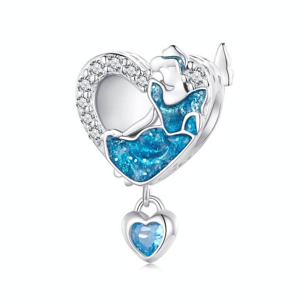 Buzzworthy Beauties: 10 Must-Have Bug-Inspired Jewelry Pieces of 2023 22 Close-up image of a Cinderella Heart Charm made of s925 sterling silver, featuring Cinderella in a blue dress, engraved text "Strong and brave, kind and kind," blue butterflies, and a hanging crystal heart.