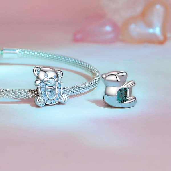 From Teddy Bears to Heartfelt Tokens: The Evolution of Love on Valentine's Day 17 S925 sterling silver U Letter Teddy Bear Love Charm. Opal-studded bear hugs the letter 'U,' a perfect addition to the Teddy Bears Love Charms Collection. Ideal for Valentine's Day gifting. #LoveCharm #TeddyBearJewelry #ValentinesGift