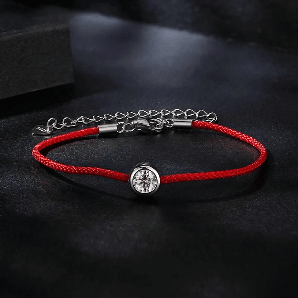 Affordable Glam: Moissanite Jewelry That Looks Expensive But Won't Break the Bank 27 Moissanite Red Rope Bracelet with 1-carat stone on silver extension. Exquisite jewelry for elegance and style.