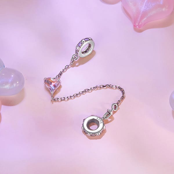 From Teddy Bears to Heartfelt Tokens: The Evolution of Love on Valentine's Day 9 S925 sterling silver Pink Heart Love Safety Chain Charm with opal stones. Elegant two-stopper design, perfect for securing your style with love. Ideal for Valentine's Day gifting.