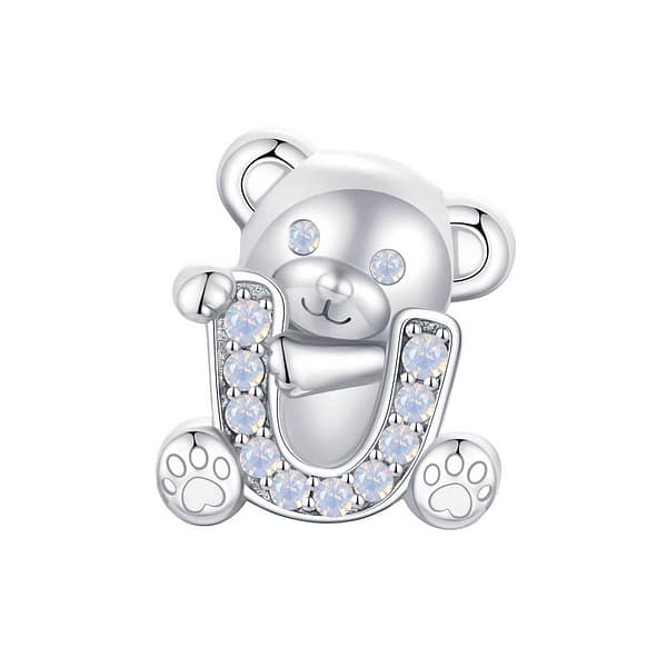 From Teddy Bears to Heartfelt Tokens: The Evolution of Love on Valentine's Day 16 S925 sterling silver U Letter Teddy Bear Love Charm. Opal-studded bear hugs the letter 'U,' a perfect addition to the Teddy Bears Love Charms Collection. Ideal for Valentine's Day gifting. #LoveCharm #TeddyBearJewelry #ValentinesGift