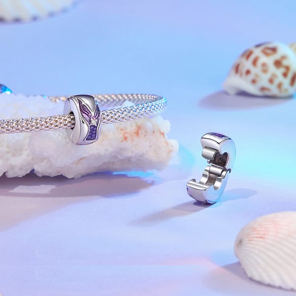 Dive into Style: 10 Must-Have Ocean-Inspired Jewelry Pieces of 2023 25 Sterling silver mermaid tail clip charm with cubic zirconia stones, part of Mermaid Legend Charms Collection.