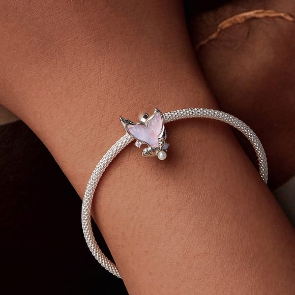 Dive into Style: 10 Must-Have Ocean-Inspired Jewelry Pieces of 2023 31 Mermaid Tail Stopper Charm in s925 sterling silver, featuring pink glass, shell, pearl, and opal stone embellishments.