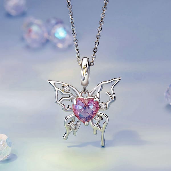 Buzzworthy Beauties: 10 Must-Have Bug-Inspired Jewelry Pieces of 2023 40 Sleeping Beauty Butterfly Charm: Sterling silver butterfly with red glass heart center and cubic zirconia stones.
