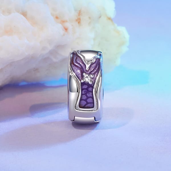 Dive into Style: 10 Must-Have Ocean-Inspired Jewelry Pieces of 2023 23 Sterling silver mermaid tail clip charm with cubic zirconia stones, part of Mermaid Legend Charms Collection.