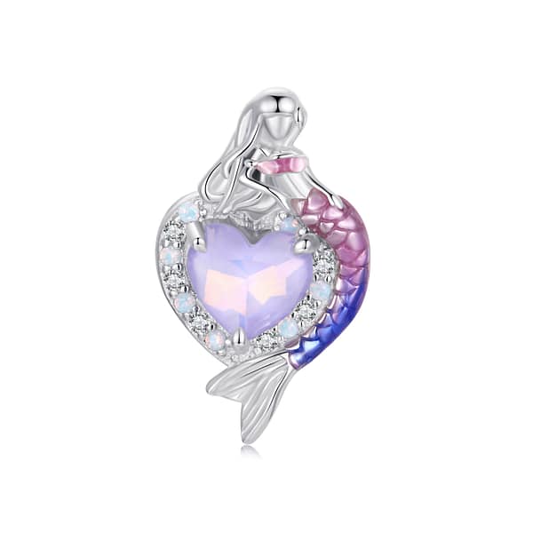 Dive into Style: 10 Must-Have Ocean-Inspired Jewelry Pieces of 2023 37 Sterling silver heart charm with pink glass center, opal, and cubic zirconia stones. Features a mermaid with pink and purple tail on one side. Back engraved with mermaid tail.