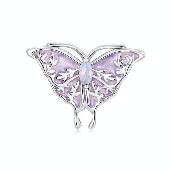 Buzzworthy Beauties: 10 Must-Have Bug-Inspired Jewelry Pieces of 2023 22 Sterling silver butterfly charm with opal stone, part of Monet's Garden Charms Collection, nature-inspired jewelry.