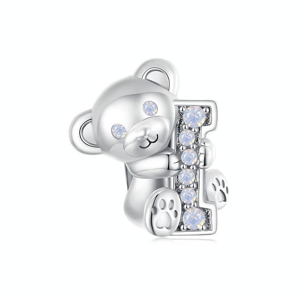 From Teddy Bears to Heartfelt Tokens: The Evolution of Love on Valentine's Day 26 Sterling silver Teddy Bear Love Charm, a romantic accessory for Valentine's Day. Opal-studded bear hugs the letter 'I'. Create 'I Love U' with our charming collection. Perfect gift for a loved one. #TeddyBearCharm #ValentinesJewelry #LoveGift