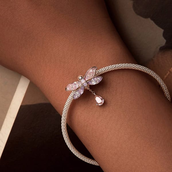 Buzzworthy Beauties: 10 Must-Have Bug-Inspired Jewelry Pieces of 2023 21 Monet's Garden Dragonfly Stopper Charm in sterling silver, adorned with pink and purple glass stones. Perfect for bracelet. Nature-inspired jewelry.