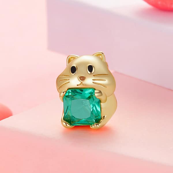 Celebrate Your Love for Pets on National Love Your Pet Day 27 Cute Gold Hamster Charm crafted from s925 sterling silver with gold plating, featuring an adorable hamster holding a green transparent glass gemstone. Part of the Pet Charms Collection, ideal for animal lovers and jewelry enthusiasts.